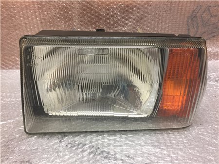 Farol dianteiro esquerdo LANCIA DELTA H4 original Carello usado